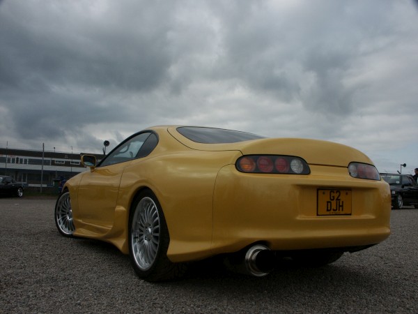 Toyota Supra Yellow Exhaust.JPG